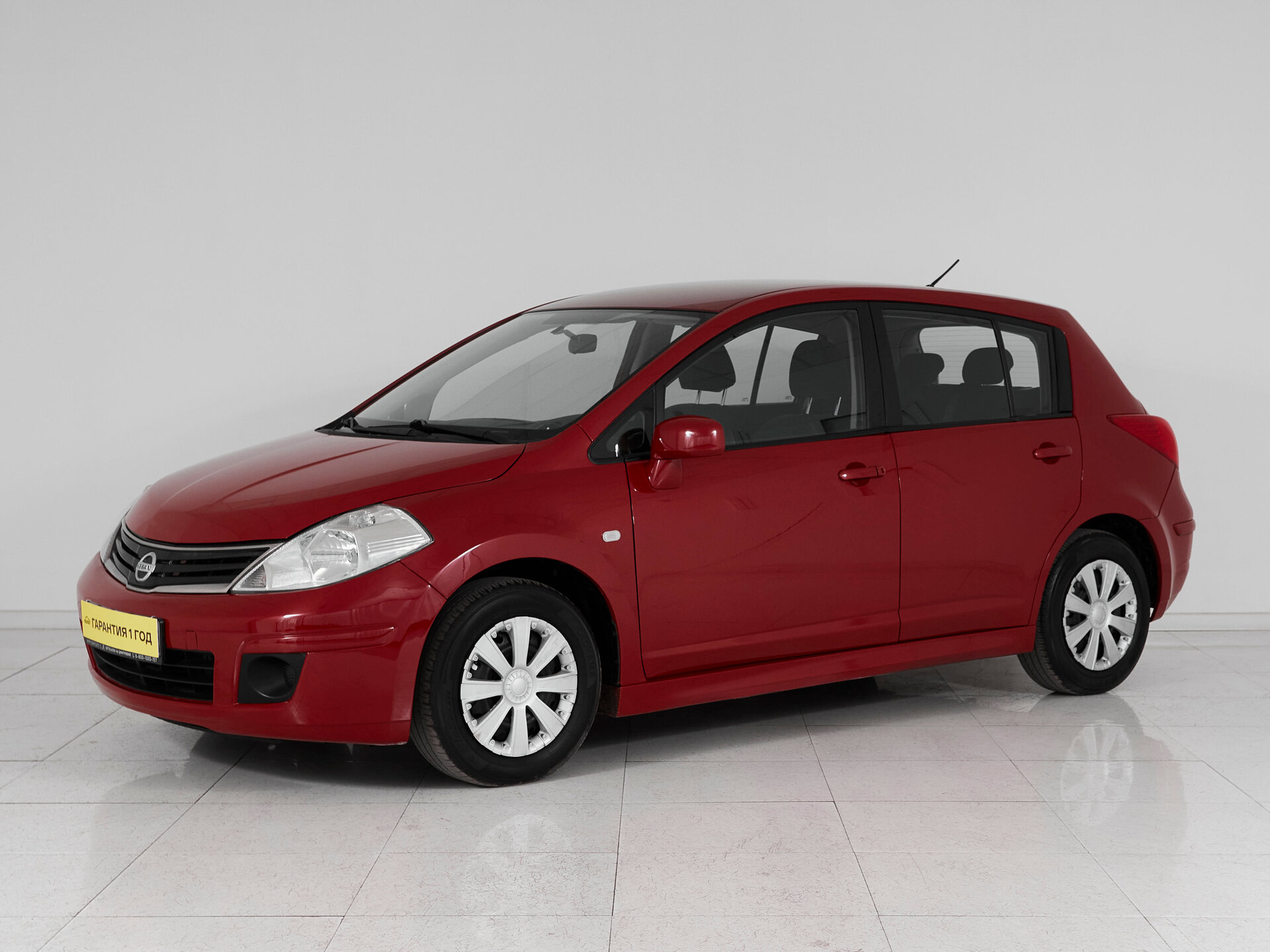 Nissan Tiida, I Рестайлинг 2010 Elegance фото