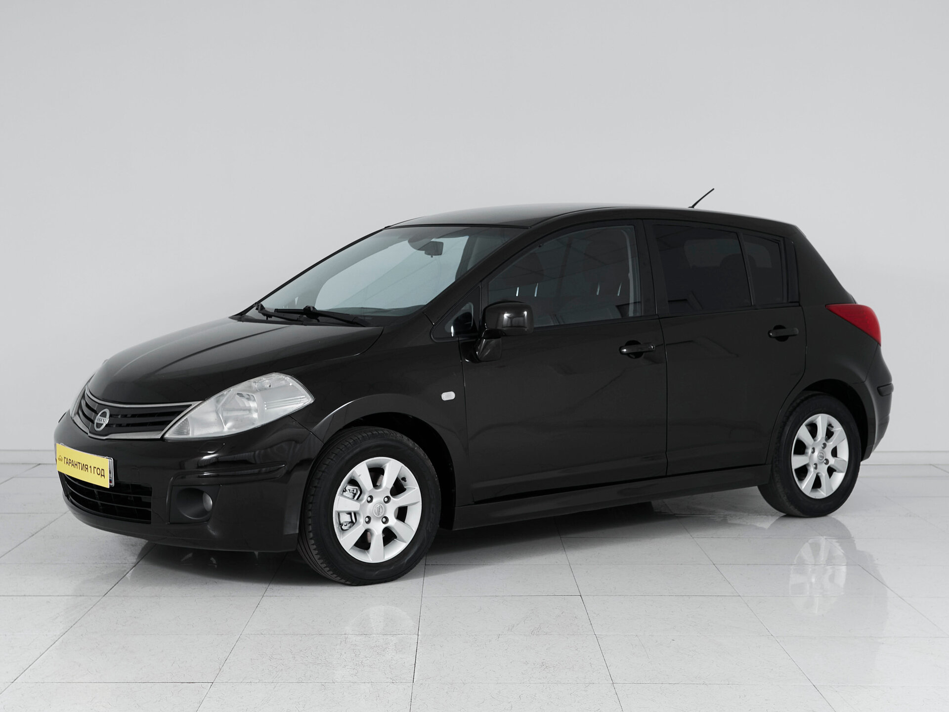 Nissan Tiida, I Рестайлинг 2011 Tekna фото