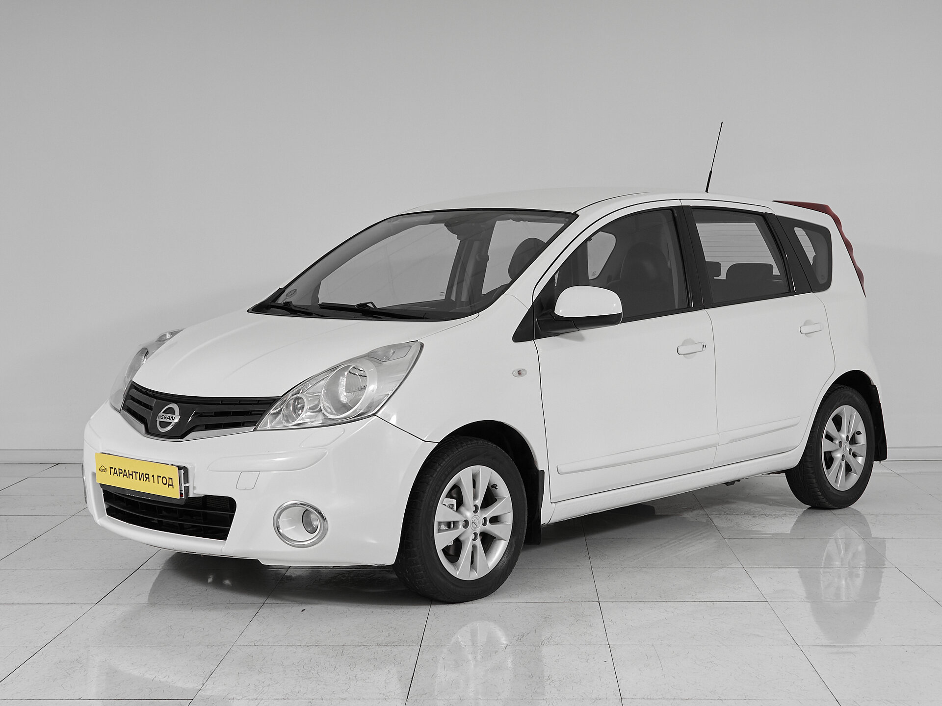 Nissan Note, I Рестайлинг 2012 Tekna фото
