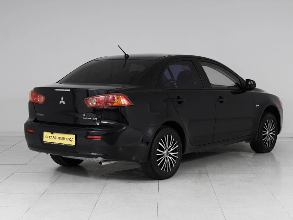 Mitsubishi Lancer, X фото №6