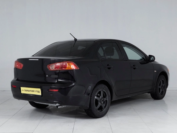 Mitsubishi Lancer, X фото №4