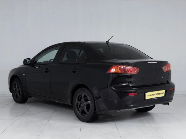 Mitsubishi Lancer, X фото №6