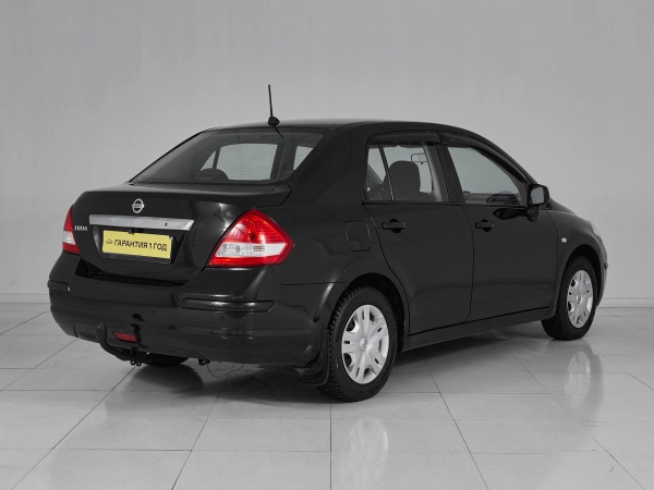 Nissan Tiida, I Рестайлинг фото №6