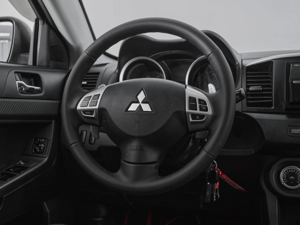 Mitsubishi Lancer, X фото №10
