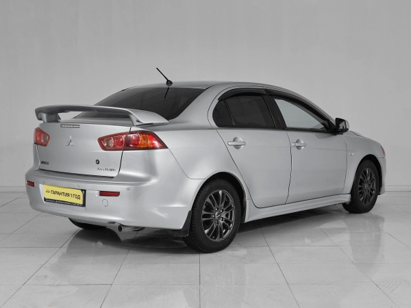 Mitsubishi Lancer, X фото №6