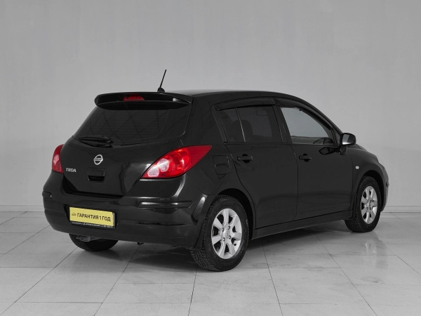 Nissan Tiida, I Рестайлинг фото №6