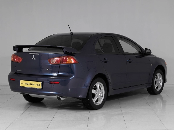 Mitsubishi Lancer, X фото №6