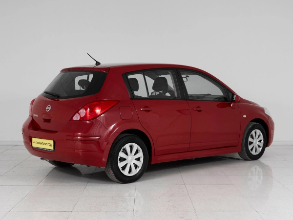 Nissan Tiida, I Рестайлинг фото №6