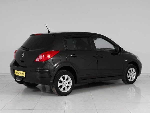 Nissan Tiida, I Рестайлинг фото №6