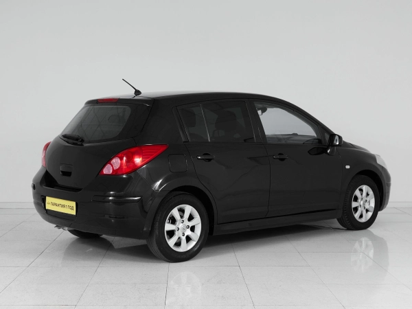 Nissan Tiida, I Рестайлинг фото №6