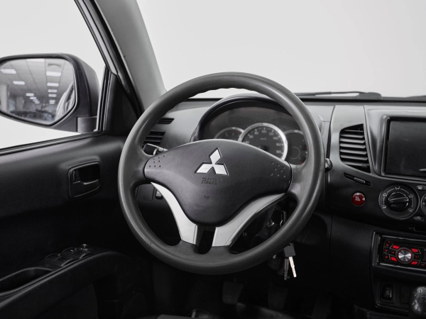 Mitsubishi L200, IV фото №10