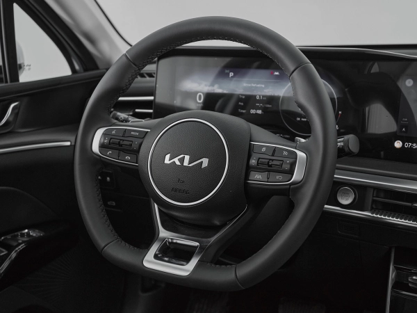 Kia K5, III фото №11