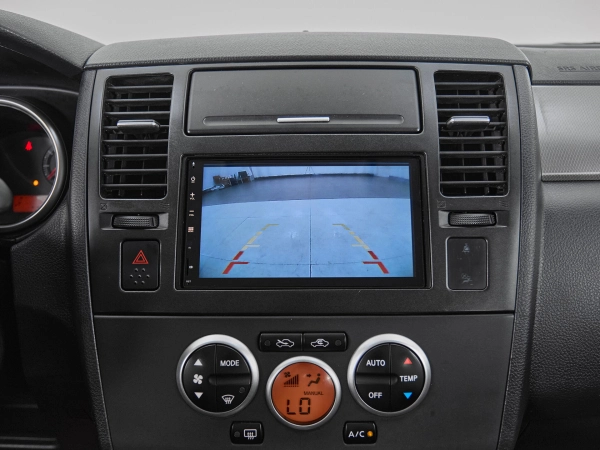 Nissan Tiida, I Рестайлинг фото №16