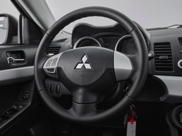 Mitsubishi Lancer, X фото №10