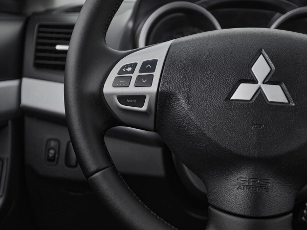 Mitsubishi Lancer, X фото №11