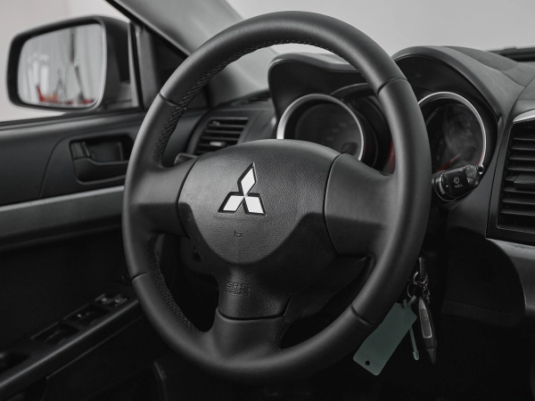 Mitsubishi Lancer, X фото №10