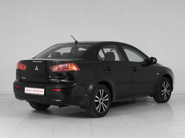 Mitsubishi Lancer, X фото №6