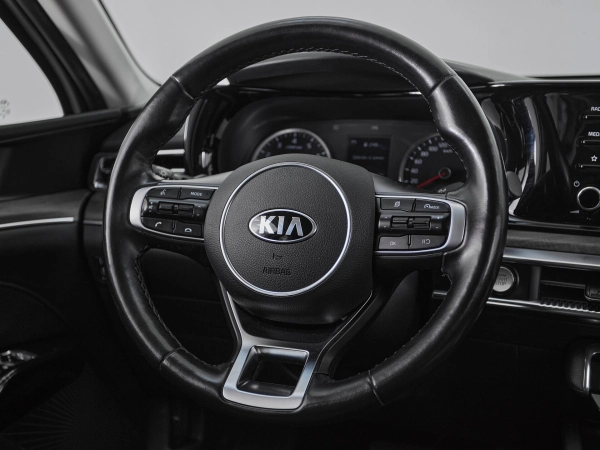 Kia K5, III фото №10
