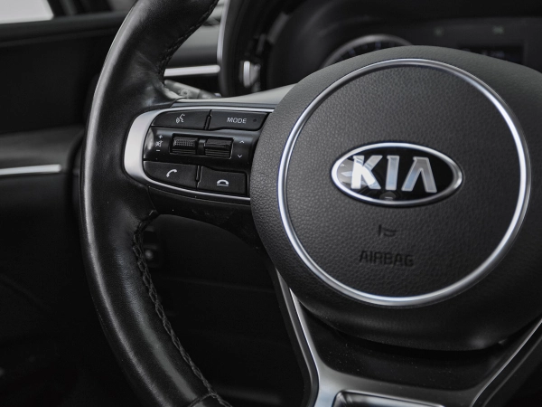 Kia K5, III фото №11