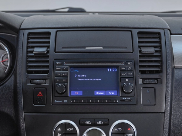 Nissan Tiida, I Рестайлинг фото №14