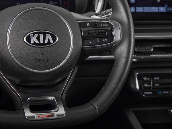 Kia K5, III фото №13