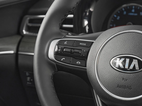 Kia K5, III фото №11