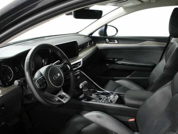 Kia K5, III фото №12