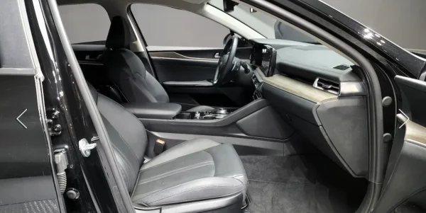 Kia K5, III фото №10