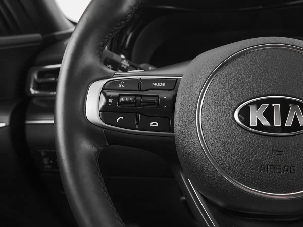 Kia K5, III фото №11