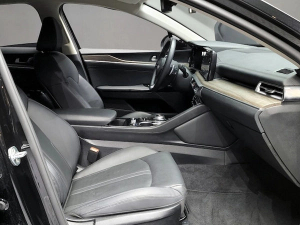Kia K5, III фото №10
